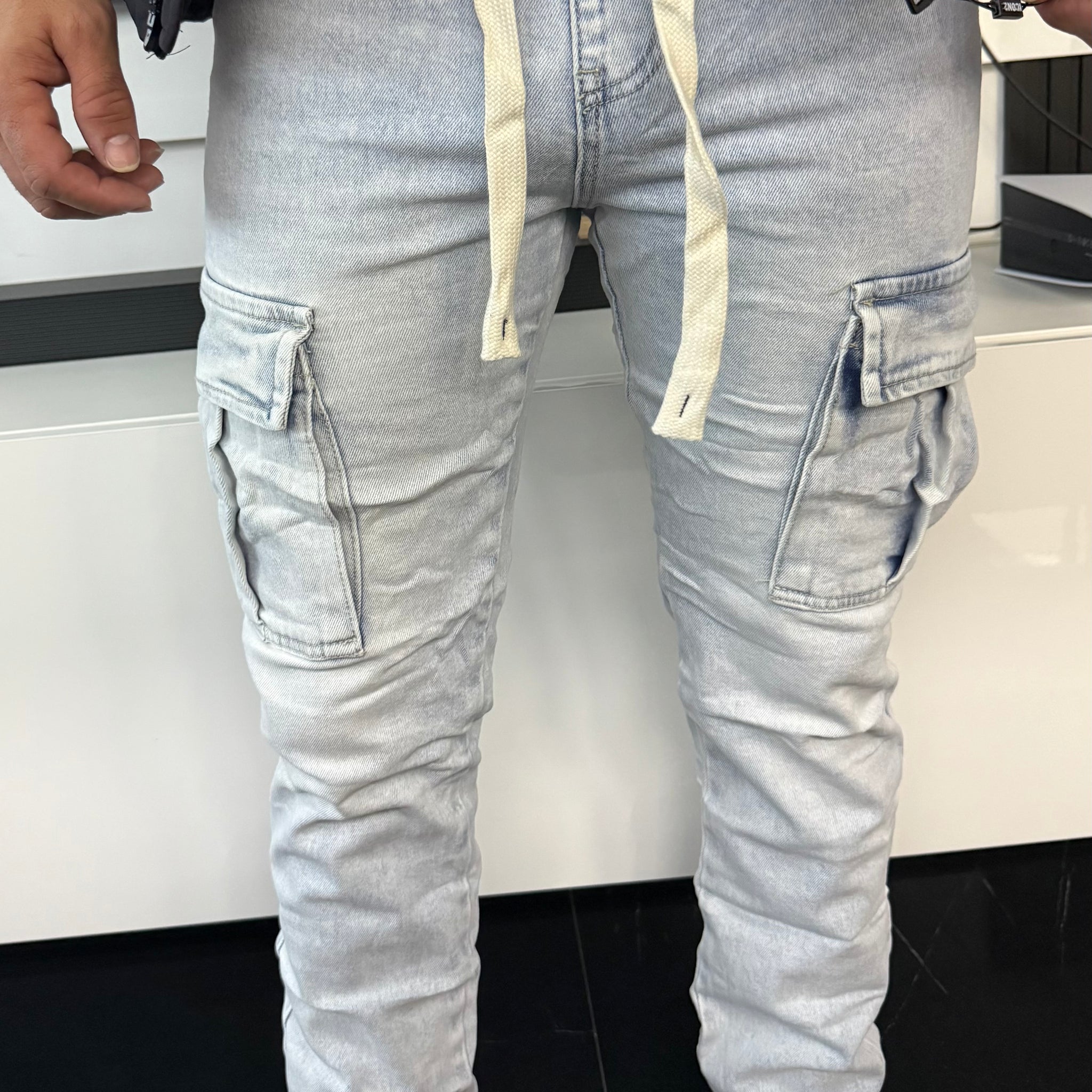 Vaqueros bolsillos con puño