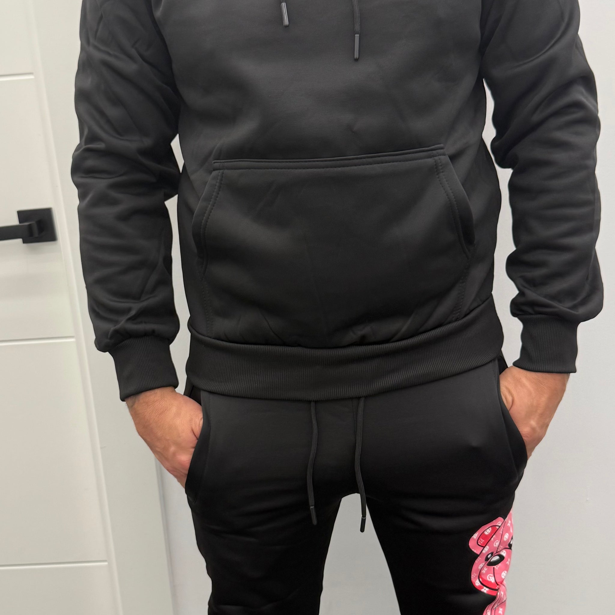 Chandal oso sentado