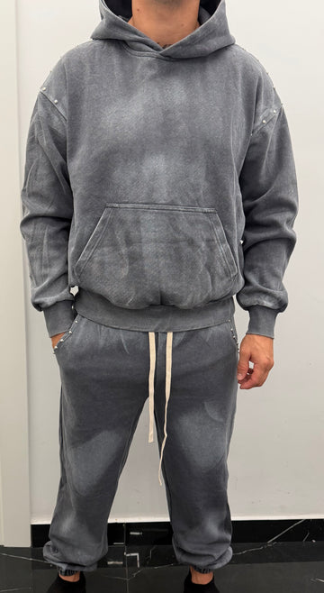 Conjunto chandal desgastado tachuela
