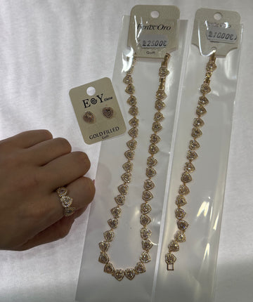 Conjunto corazones oro